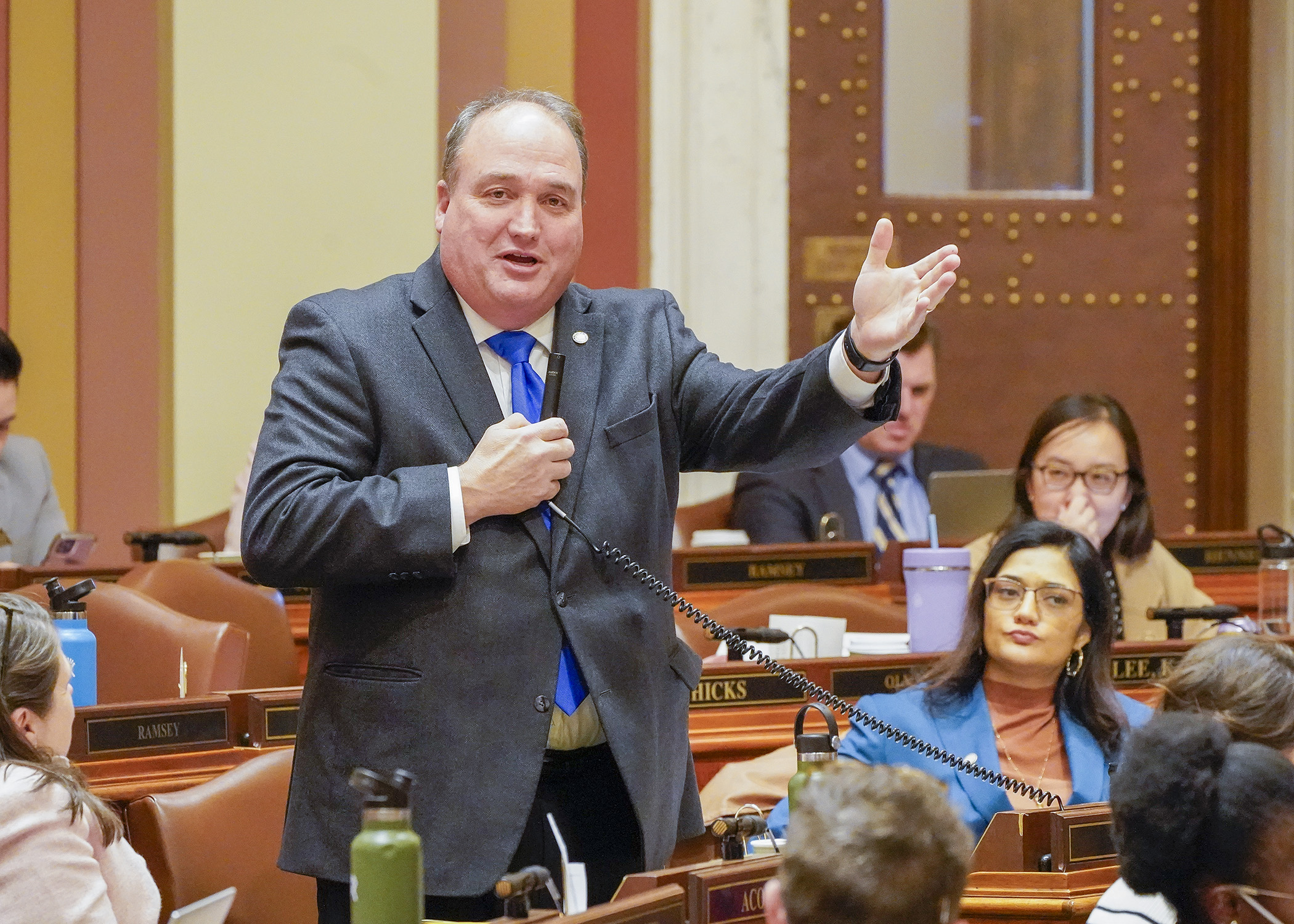 Rep. John Huot presents SF33 on the House Floor Feb. 6. The bill would appropriate additional money to the Office of the Attorney General to provide legal services for enhanced criminal enforcement and related initiatives. (Photo by Andrew VonBank)